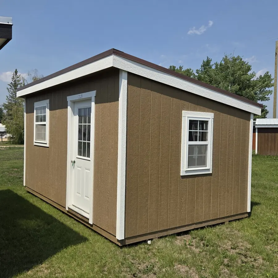 Brown modern shed with white trim, a white door and two windows
